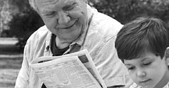 Grandfather Reading to Child